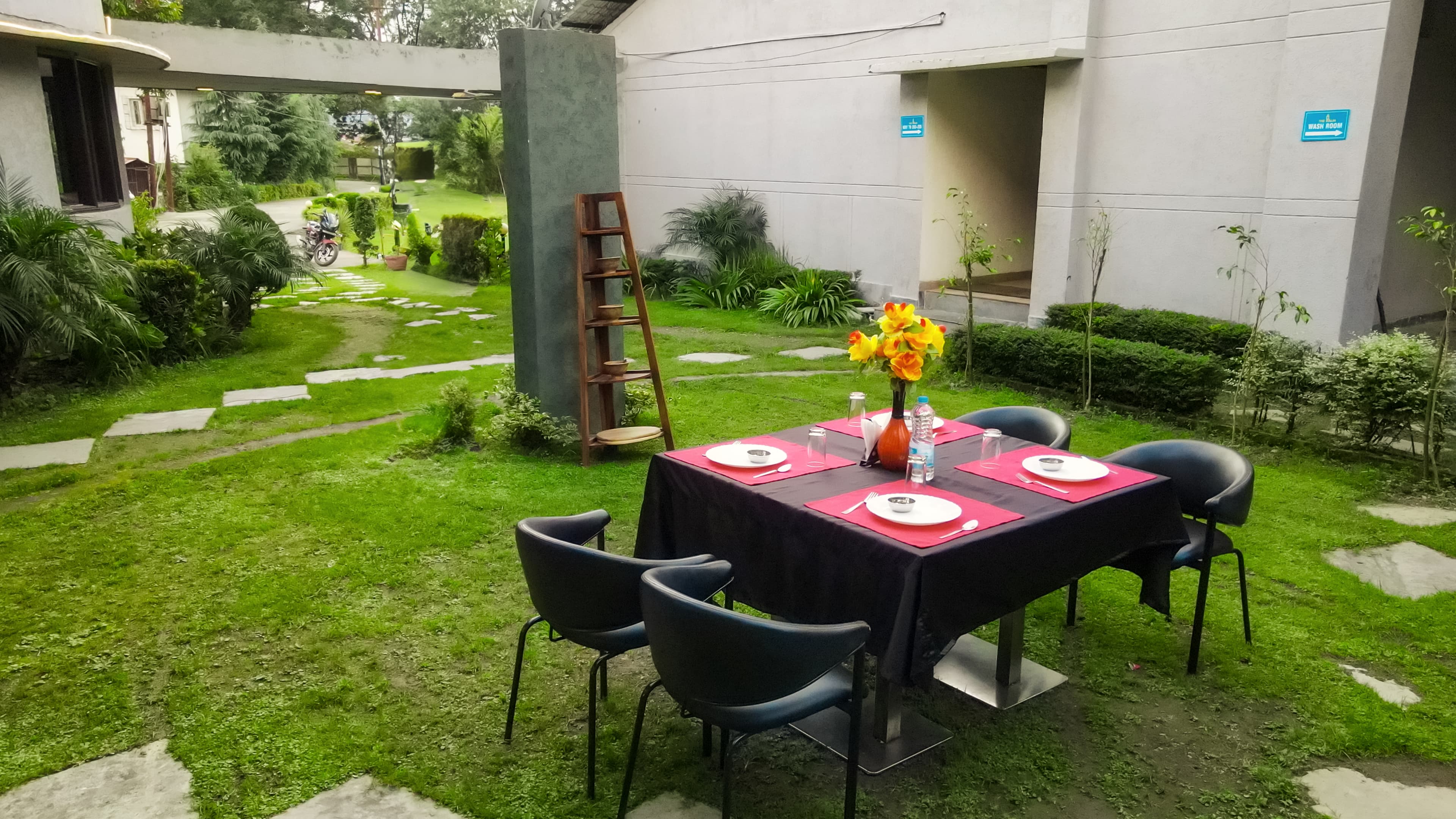 Garden dining setup at The Palm Resort